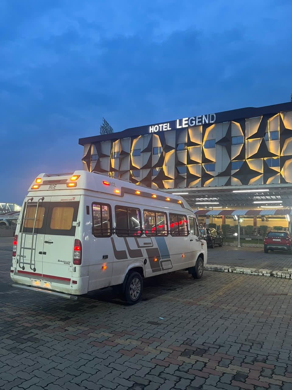 Tempo Traveller at a hotel pickup