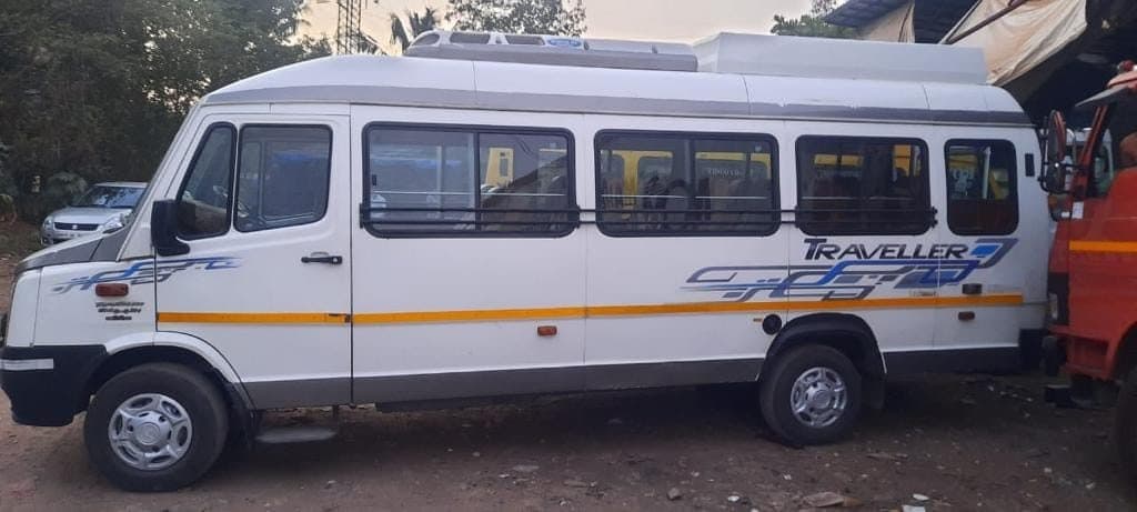 26 Seater Tempo Traveller — Side profile